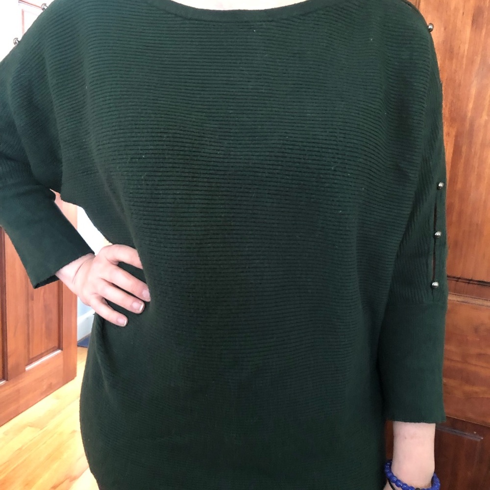 Jennifer Lopez green sweater